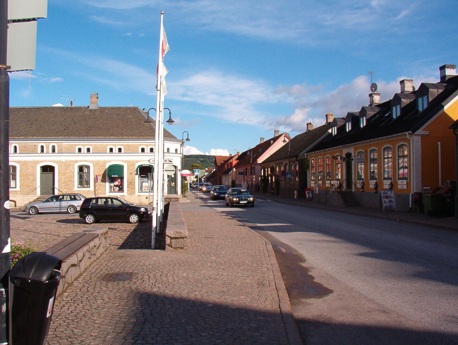 Fred J. https://commons.wikimedia.org/wiki/File:B%C3%A5stad,_Sweden,_a_street_adjacent_to_market_square.jpg